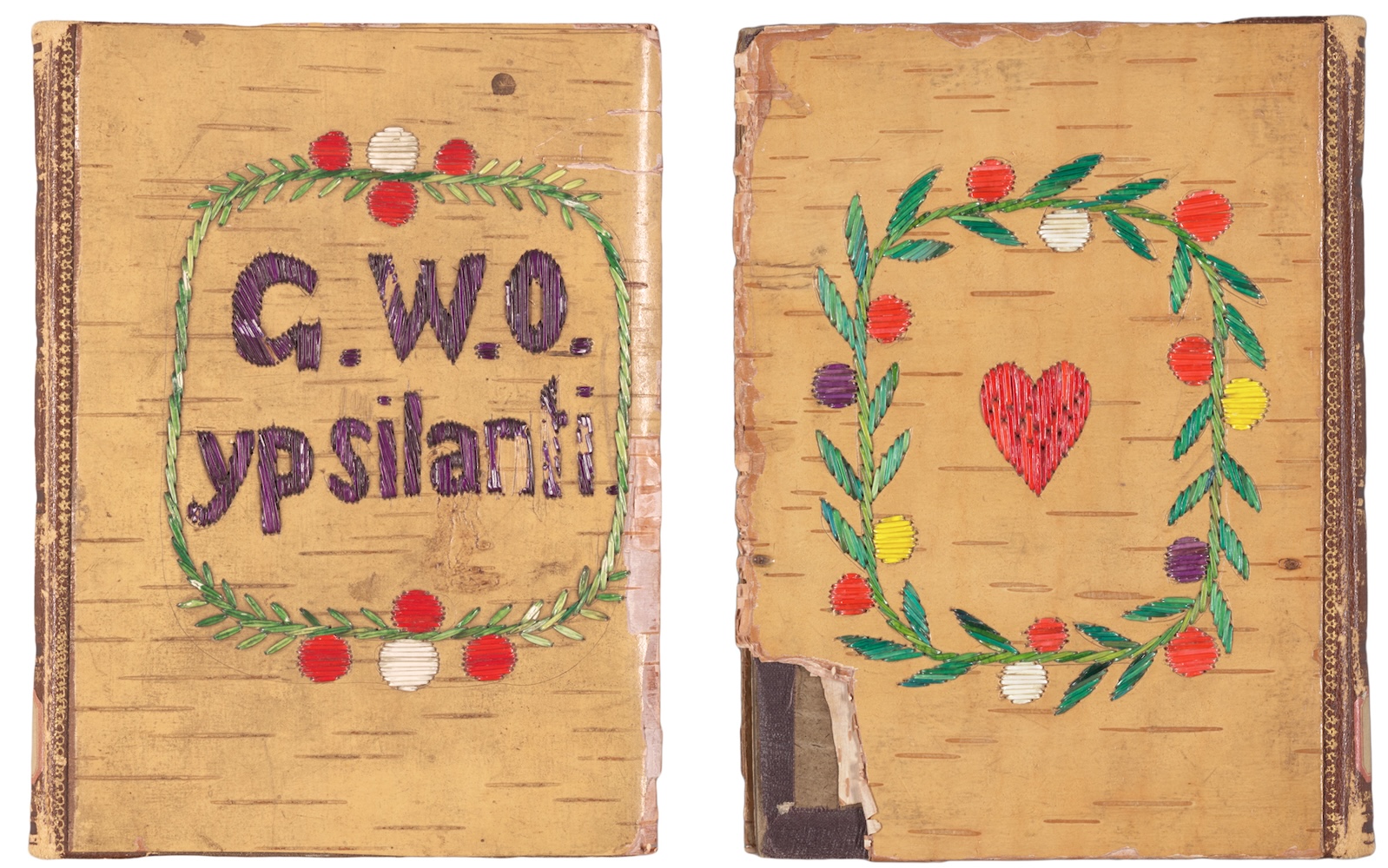 Photos of the front and back covers of a book bound in birch bark and decorated with colorful quillwork wreaths and a red heart. The front cover also has quillwork text reading, "G. W. O. ypsilanti".